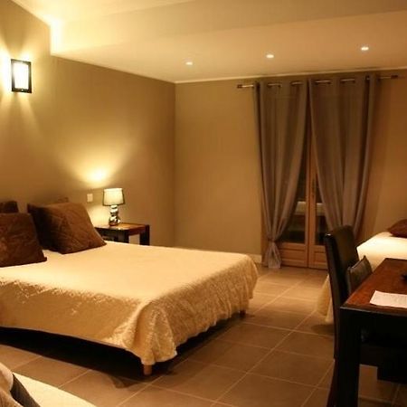L'Hotellerie Kouros Cuers Rom bilde