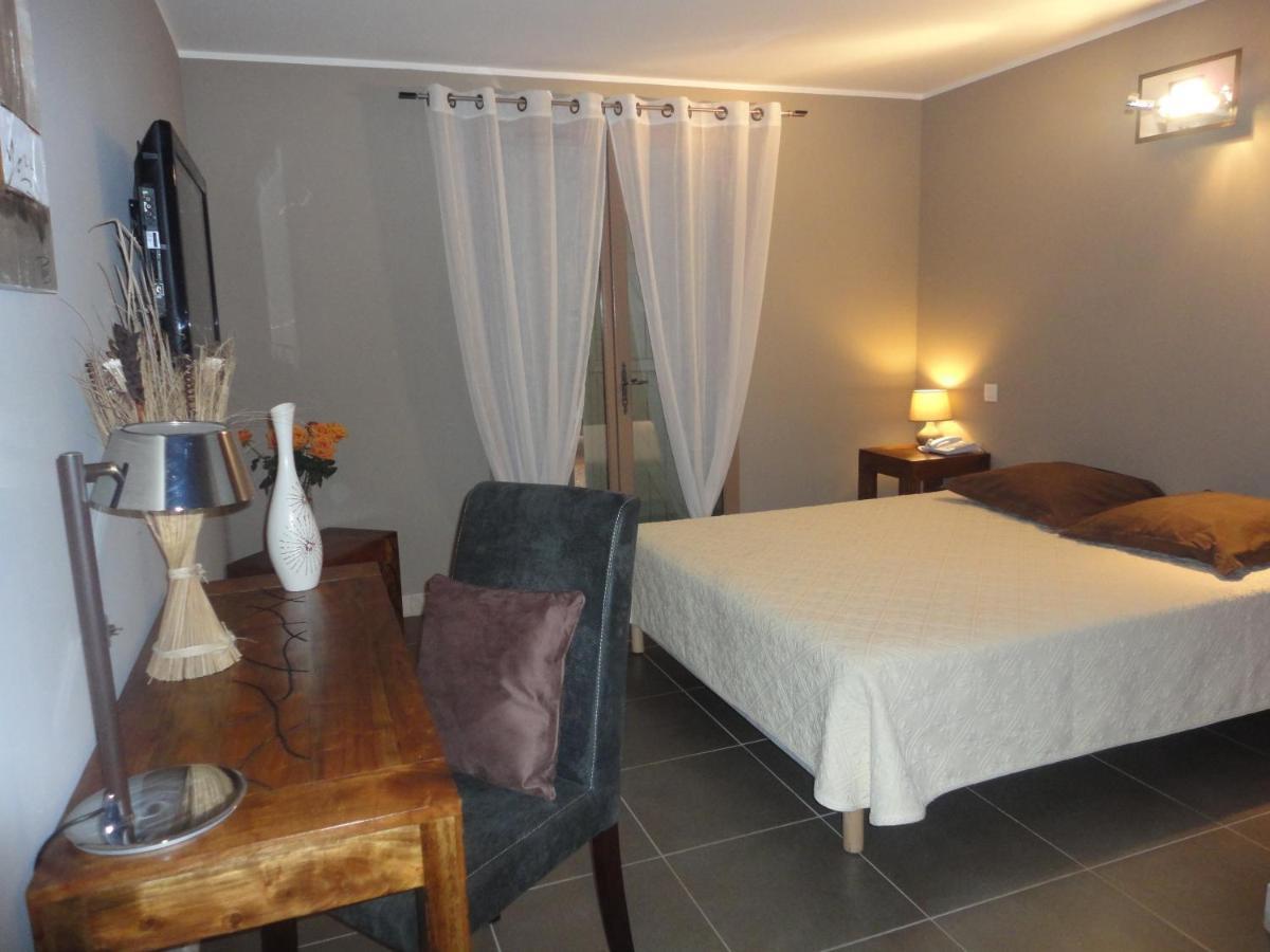 L'Hotellerie Kouros Cuers Rom bilde